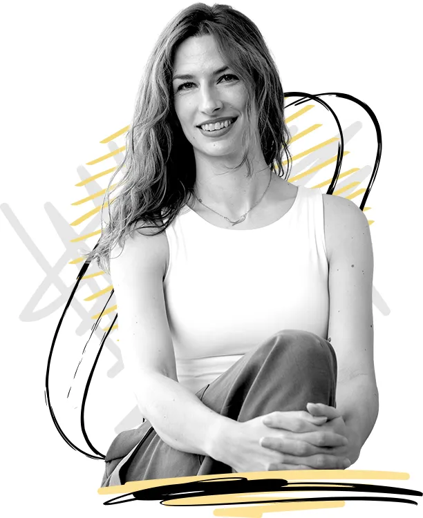 Professional Croatian translator for businesses Ivana Srezović sitting and looking at the camera.