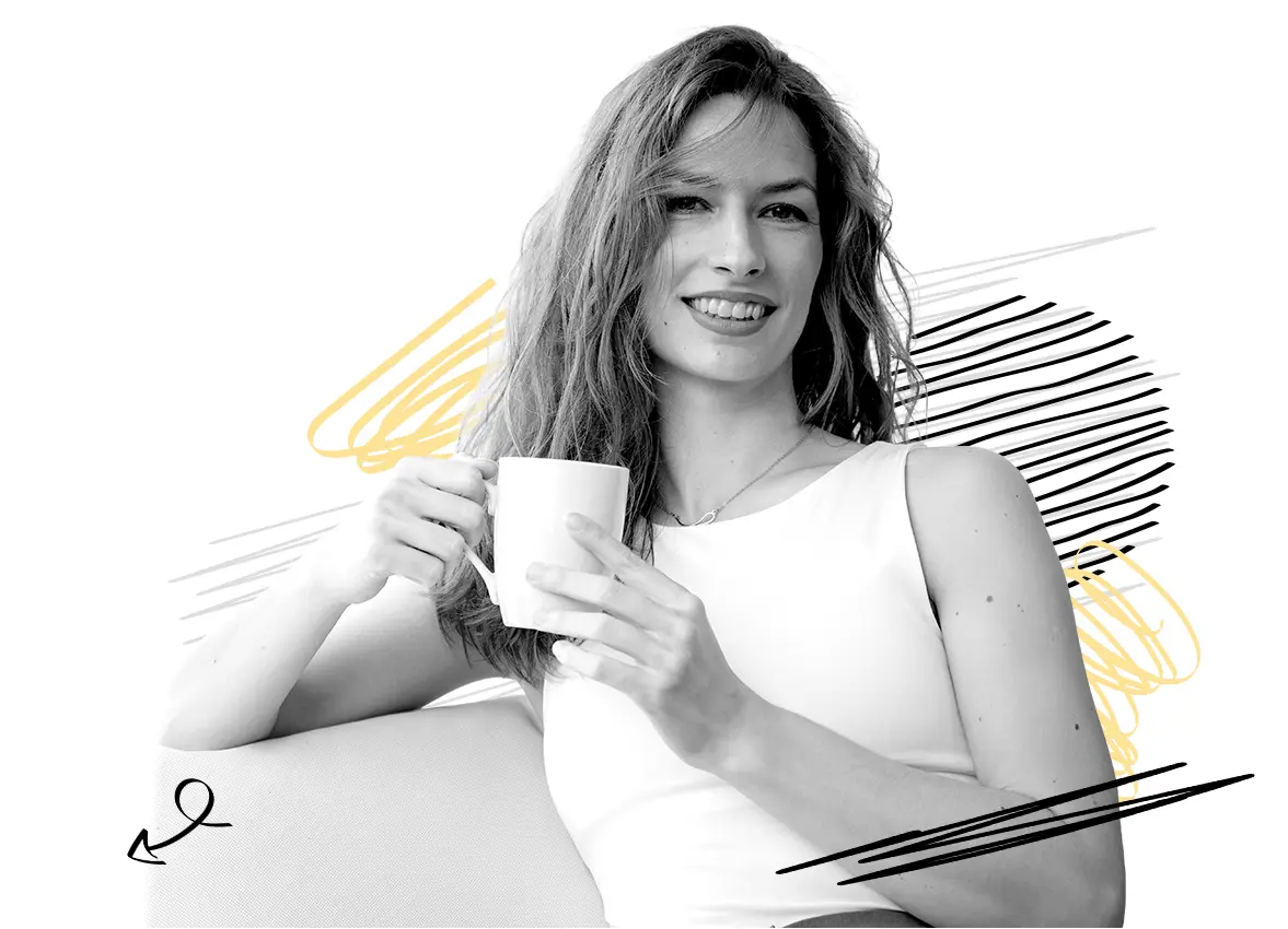 Marketing translator and transcreation specialist for Croatian holding a coffee cup and looking at the camera.